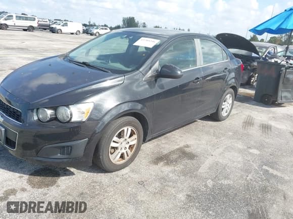 ✅ 2014 Chevrolet Sonic LT • VIN: 1G1JC5SH9E4151553 • Lot: 43789246. Listed on IAAI with 95,937 mi. Free auction sales archive from the USA and detailed vehicle history report at DreamBid. Image 2.