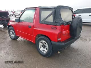 ✅ 1996 Chevrolet Tracker • VIN: 2CNBE1865T6946093 • Лот: 42120266. Опубликован ранее на IAAI с пробегом 180 736 миль. Бесплатный доступ к архиву аукционных продаж из США и подробный отчёт об истории автомобиля на DreamBid. Изображение 3.