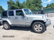 ✅ 2008 Jeep Wrangler Unlimited Sahara • VIN: 1J8GA591X8L628123 • Lot: 43102623. Listed on IAAI with 231,500 mi. Free auction sales archive from the USA and detailed vehicle history report at DreamBid. Image 13.