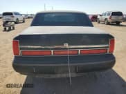 ✅ 1997 Lincoln Town Car Signature • VIN: 1LNLM82W3VY750465 • Lot: 75569864. Wystawiony na Copart z przebiegiem 147 446 mil. Bezpłatny archiwum sprzedaży aukcyjnych z USA i szczegółowy raport historii pojazdu na DreamBid. Zdjęcie 6.