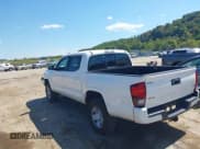 ✅ 2021 Toyota Tacoma SR • VIN: 3TYCZ5AN6MT030881 • Лот: 43217122. Опубликован ранее на IAAI с пробегом 100 699 миль. Бесплатный доступ к архиву аукционных продаж из США и подробный отчёт об истории автомобиля на DreamBid. Изображение 3.