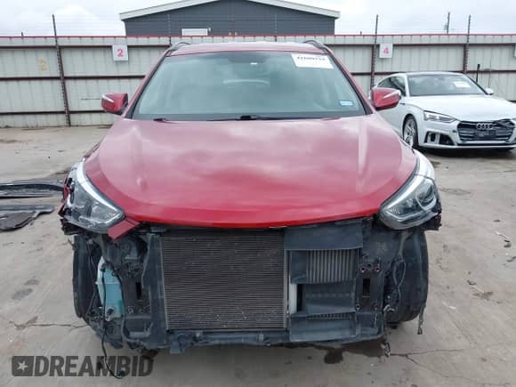 2017 Hyundai Santa Fe 2.0T z VIN 5XYZU4LA6HG409438, wystawiony jako IAAI lot #41680534 z przebiegiem 84 035 mil mil oraz . Historia ofert i sprzedaży dostępna na DreamBid. Obrazek 13.