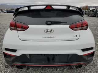 2022 Hyundai Veloster с VIN KMHT36AHXNU014379, выставлен на аукционе Copart как лот 82421394 с пробегом 36 146 миль миль и Списание • Salvage title. История ставок и продаж доступна на DreamBid. Изображение 6.