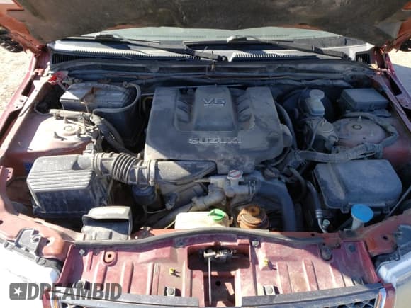 ✅ 2007 Suzuki Grand Vitara Luxury • VIN: JS3TE947674200055 • Lot: 60759184. Wystawiony na Copart z przebiegiem 179 898 mil. Bezpłatny archiwum sprzedaży aukcyjnych z USA i szczegółowy raport historii pojazdu na DreamBid. Zdjęcie 13.