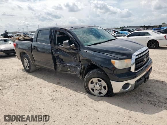 ✅ 2012 Toyota Tundra • VIN: 5TFEM5F17CX051093 • Lot: 63608495. Listed on Copart with 193,451 mi. Free auction sales archive from the USA and detailed vehicle history report at DreamBid. Image 4.