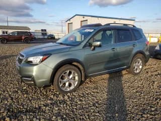 ✅ 2018 Subaru Forester Touring • VIN: JF2SJAWC6JH587984 • Lot: 93379085. Listed on Copart with 100,984 mi. Free auction sales archive from the USA and detailed vehicle history report at DreamBid. Image 1.