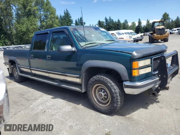 ✅ 1998 GMC Sierra 3500 • VIN: 1GTHK33J6WF041953 • Lot: 64700085. Listed on Copart with 196,848 mi. Free auction sales archive from the USA and detailed vehicle history report at DreamBid. Image 4.