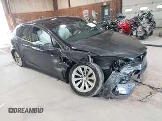 ✅ 2018 Tesla Model X 75D • VIN: 5YJXCDE23JF125715 • Lot: 43004077. Listed on IAAI with 85,630 mi. Free auction sales archive from the USA and detailed vehicle history report at DreamBid. Image 1.