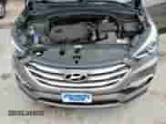 2017 Hyundai Santa Fe 2.0T z VIN 5XYZUDLA9HG437458, wystawiony jako Copart lot #57751415 z przebiegiem 117 469 mil mil oraz Szkoda całkowita • Salvage title. Historia ofert i sprzedaży dostępna na DreamBid. Obrazek 12.