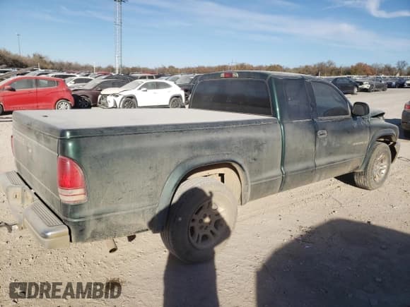 ✅ 2002 Dodge Dakota SLT • VIN: 1B7GL42N02S566740 • Lot: 82446964. Wystawiony na Copart z przebiegiem 244 432 mil. Bezpłatny archiwum sprzedaży aukcyjnych z USA i szczegółowy raport historii pojazdu na DreamBid. Zdjęcie 3.
