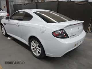 2008 Hyundai Tiburon GS с VIN KMHHM66D98U280005, выставлен на аукционе IAAI как лот 42580014 с пробегом 267 858 миль миль и . История ставок и продаж доступна на DreamBid. Изображение 3.