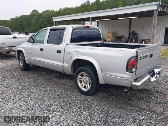 ✅ 2002 Dodge Dakota SLT • VIN: 1B7HL48N92S522859 • Lot: 43391019. Listed on IAAI with 242,154 mi. Free auction sales archive from the USA and detailed vehicle history report at DreamBid. Image 3.