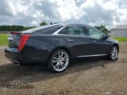 ✅ 2014 Cadillac XTS Premium • VIN: 2G61R5S38E9215110 • Лот: 68746295. Опубликован ранее на Copart с пробегом 77 342 миль. Бесплатный доступ к архиву аукционных продаж из США и подробный отчёт об истории автомобиля на DreamBid. Изображение 3.