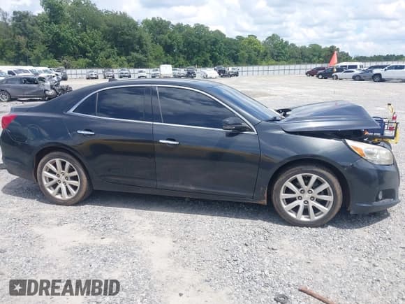 ✅ 2013 Chevrolet Malibu LTZ • VIN: 1G11H5SA6DF190026 • Lot: 42984401. Listed on IAAI with Not provided. Free auction sales archive from the USA and detailed vehicle history report at DreamBid. Image 13.