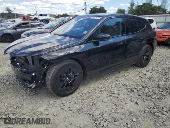 ✅ 2023 BMW iX xDrive50 • VIN: WB523CF02PCM78966 • Lot: 69629735. Wystawiony na Copart z przebiegiem 21 312 mil. Bezpłatny archiwum sprzedaży aukcyjnych z USA i szczegółowy raport historii pojazdu na DreamBid. Zdjęcie 1.