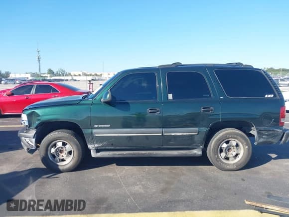 ✅ 2002 Chevrolet Tahoe LS • VIN: 1GNEC13V02R231836 • Lot: 43587799. Listed on IAAI with 159,744 mi. Free auction sales archive from the USA and detailed vehicle history report at DreamBid. Image 13.