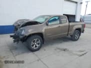 ✅ 2016 Chevrolet Colorado 4WD Z71 • VIN: 1GCHTDE36G1371219 • Лот: 48569865. Опубликован ранее на Copart с пробегом 106 330 миль. Бесплатный доступ к архиву аукционных продаж из США и подробный отчёт об истории автомобиля на DreamBid. Изображение 1.