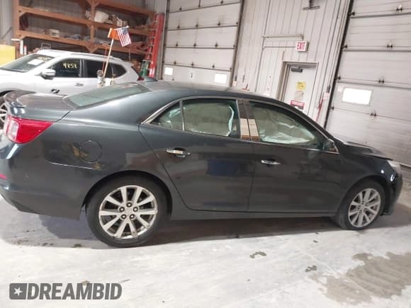 ✅ 2014 Chevrolet Malibu LTZ • VIN: 1G11H5SL7EF132977 • Lot: 43489929. Listed on IAAI with 144,561 mi. Free auction sales archive from the USA and detailed vehicle history report at DreamBid. Image 13.