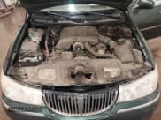 ✅ 1998 Lincoln Town Car Signature • VIN: 1LNFM82W8WY720232 • Lot: 42125723. Listed on IAAI with 132,494 mi. Free auction sales archive from the USA and detailed vehicle history report at DreamBid. Image 10.