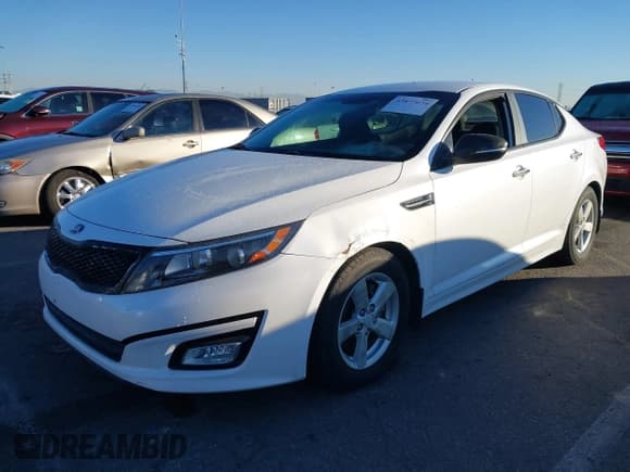 ✅ 2015 Kia Optima LX • VIN: KNAGM4A79F5589418 • Lot: 43877674. Listed on IAAI with 80,600 mi. Free auction sales archive from the USA and detailed vehicle history report at DreamBid. Image 2.
