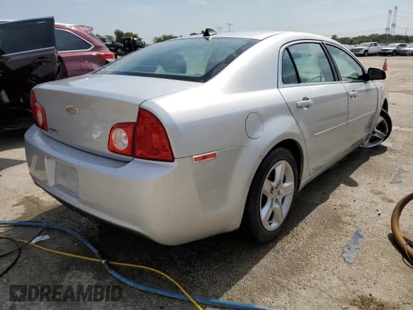 ✅ 2012 Chevrolet Malibu 1LS • VIN: 1G1ZB5E07CF280758 • Lot: 72176634. Listed on Copart with 135,620 mi. Free auction sales archive from the USA and detailed vehicle history report at DreamBid. Image 3.
