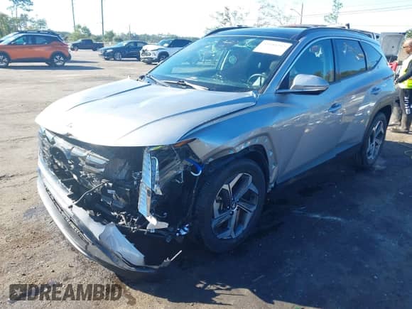 2022 Hyundai Tucson Limited with VIN KM8JECA16NU031649, listed as a IAAI auction lot 43544252 with 48,612 mi miles and . Bid and sale history available at DreamBid. Image 2.