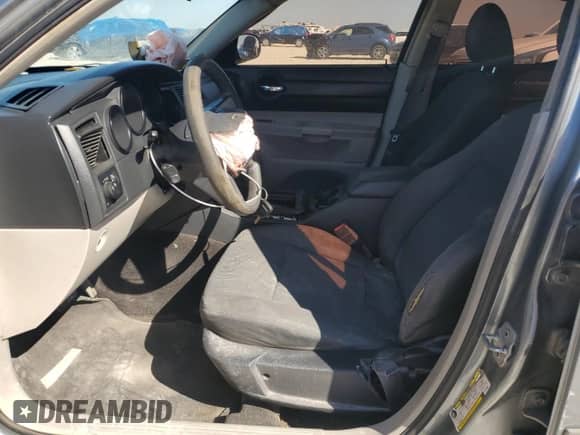 2007 Dodge Charger z VIN 2B3KA43G87H778589, wystawiony jako Copart lot #70492974 z przebiegiem 284 406 mil mil oraz Szkoda całkowita • Salvage title. Historia ofert i sprzedaży dostępna na DreamBid. Obrazek 7.