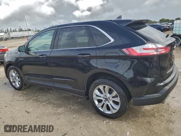 ✅ 2022 Ford Edge Titanium • VIN: 2FMPK4K97NBA39830 • Lot: 94776445. Wystawiony na Copart z przebiegiem 110 783 mil. Bezpłatny archiwum sprzedaży aukcyjnych z USA i szczegółowy raport historii pojazdu na DreamBid. Zdjęcie 2.
