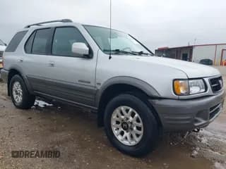 ✅ 2001 Honda Passport LX • VIN: 4S6DM58W214400568 • Lot: 43901495. Listed on IAAI with 125,005 mi. Free auction sales archive from the USA and detailed vehicle history report at DreamBid. Image 1.