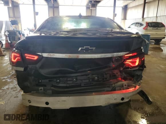 ✅ 2014 Chevrolet Impala LT • VIN: 2G1115SL2E9233132 • Lot: 58823345. Listed on Copart with 90,764 mi. Free auction sales archive from the USA and detailed vehicle history report at DreamBid. Image 6.