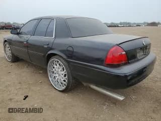 ✅ 2003 Mercury Marauder • VIN: 2MEHM75V73X636648 • Лот: 61054815. Опубликован ранее на Copart с пробегом 123 119 миль. Бесплатный доступ к архиву аукционных продаж из США и подробный отчёт об истории автомобиля на DreamBid. Изображение 2.