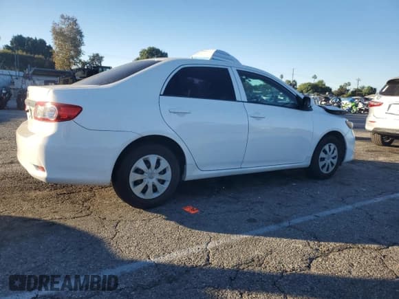 ✅ 2013 Toyota Corolla L • VIN: 5YFBU4EE0DP205354 • Lot: 92176175. Listed on Copart with 131,743 mi. Free auction sales archive from the USA and detailed vehicle history report at DreamBid. Image 3.