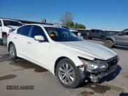 ✅ 2014 Infiniti Q50 Premium • VIN: JN1BV7ARXEM687779 • Lot: 43640213. Listed on IAAI with 187,762 mi. Free auction sales archive from the USA and detailed vehicle history report at DreamBid. Image 1.