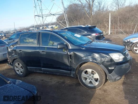 ✅ 2013 Chevrolet Captiva Sport LS • VIN: 3GNAL2EK5DS637098 • Lot: 41881819. Wystawiony na IAAI z przebiegiem 147 731 mil. Bezpłatny archiwum sprzedaży aukcyjnych z USA i szczegółowy raport historii pojazdu na DreamBid. Zdjęcie 13.
