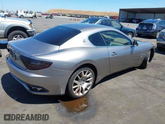 ✅ 2009 Maserati GranTurismo • VIN: ZAMGJ45A690042878 • Lot: 41411767. Listed on IAAI with Not provided. Free auction sales archive from the USA and detailed vehicle history report at DreamBid. Image 4.
