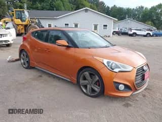 2014 Hyundai Veloster Turbo с VIN KMHTC6AE3EU189451, выставлен на аукционе IAAI как лот 42983891 с пробегом 190 879 миль миль и . История ставок и продаж доступна на DreamBid. Изображение 1.