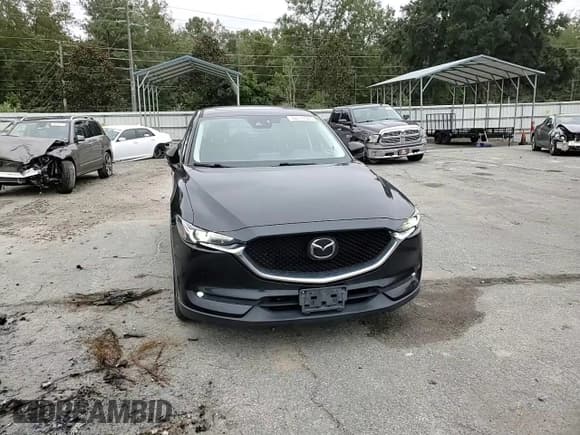 ✅ 2019 Mazda CX-5 Grand Touring • VIN: JM3KFBDM9K0549030 • Лот: 82774585. Опубликован ранее на Copart с пробегом 74 307 миль. Бесплатный доступ к архиву аукционных продаж из США и подробный отчёт об истории автомобиля на DreamBid. Изображение 14.