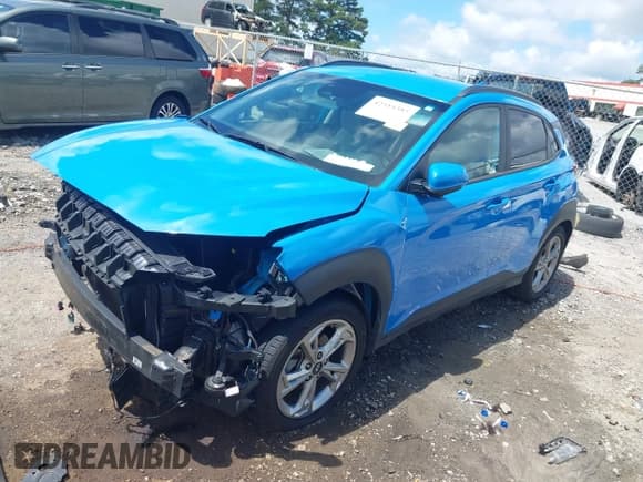 ✅ 2022 Hyundai Kona SEL • VIN: KM8K62AB6NU803457 • Лот: 42514385. Опубликован ранее на IAAI с пробегом 76 300 миль. Бесплатный доступ к архиву аукционных продаж из США и подробный отчёт об истории автомобиля на DreamBid. Изображение 2.