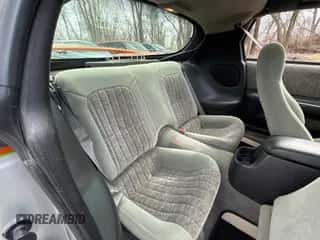 2000 Chevrolet Camaro Z28 z VIN 2G1FP22G9Y2164104, wystawiony jako Copart lot #48547525 z przebiegiem 68 895 mil mil oraz Czysty tytuł • Clean title. Historia ofert i sprzedaży dostępna na DreamBid. Obrazek 6.