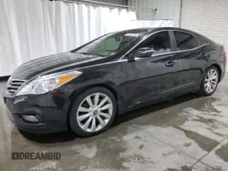 2013 Hyundai Azera z VIN KMHFH4JG2DA329347, wystawiony jako Copart lot #75648224 z przebiegiem 170 134 mil mil oraz Czysty tytuł • Clean title. Historia ofert i sprzedaży dostępna na DreamBid. Obrazek 1.