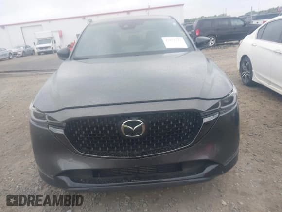 ✅ 2024 Mazda CX-5 Premium • VIN: JM3KFBDYXR0438998 • Lot: 41971111. Listed on IAAI with 17,452 mi. Free auction sales archive from the USA and detailed vehicle history report at DreamBid. Image 12.