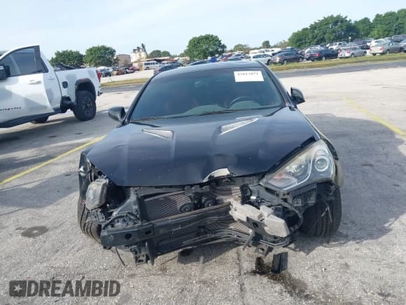 ✅ 2013 Hyundai Genesis Coupe Track • VIN: KMHHU6KJ1DU104166 • Lot: 43817871. Wystawiony na IAAI z przebiegiem 105 395 mil. Bezpłatny archiwum sprzedaży aukcyjnych z USA i szczegółowy raport historii pojazdu na DreamBid. Zdjęcie 6.