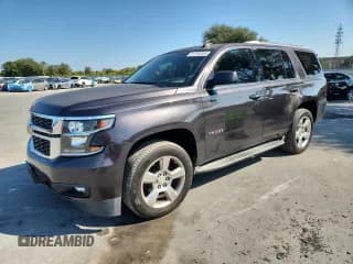 ✅ 2015 Chevrolet Tahoe LT • VIN: 1GNSKBKC5FR506442 • Lot: 91740365. Listed on Copart with 144,026 mi. Free auction sales archive from the USA and detailed vehicle history report at DreamBid. Image 1.