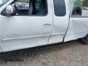 ✅ 1999 Ford F-150 XL • VIN: 1FTRX17L2XNB70799 • Lot: 42762580. Listed on IAAI with Not provided. Free auction sales archive from the USA and detailed vehicle history report at DreamBid. Image 12.