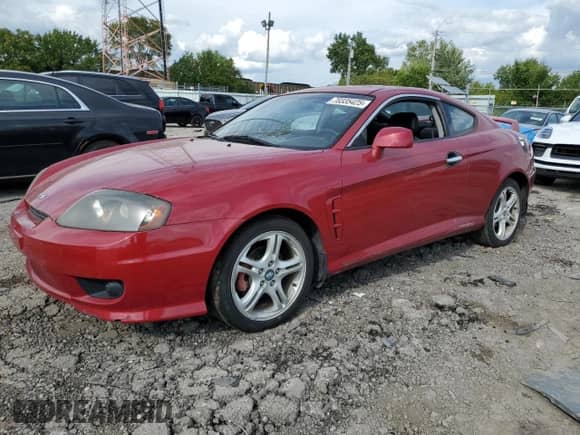 2005 Hyundai Tiburon GT with VIN KMHHN65F25U160235, listed as a Copart auction lot 83780185 with 209,095 mi miles and Non repairable. Bid and sale history available at DreamBid. Image 1.