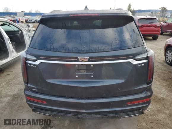 ✅ 2022 Cadillac XT6 Sport • VIN: 1GYKPGRS0NZ177677 • Lot: 81259824. Wystawiony na Copart z przebiegiem 13 935 mil. Bezpłatny archiwum sprzedaży aukcyjnych z USA i szczegółowy raport historii pojazdu na DreamBid. Zdjęcie 6.