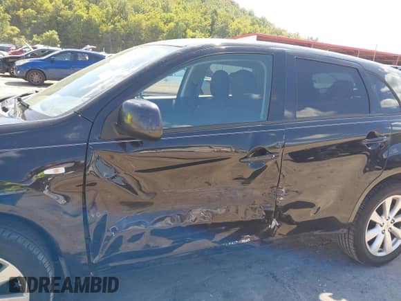 2015 Mitsubishi Outlander ES with VIN 4A4AP3AU6FE010443, listed as a IAAI auction lot 43188413 with 148,484 mi miles and . Bid and sale history available at DreamBid. Image 6.