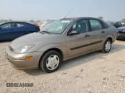✅ 2004 Ford Focus LX • VIN: 1FAFP33P94W121604 • Лот: 67125185. Опубликован ранее на Copart с пробегом 104 327 миль. Бесплатный доступ к архиву аукционных продаж из США и подробный отчёт об истории автомобиля на DreamBid. Изображение 1.