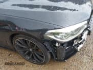 ✅ 2018 BMW 5 Series M550i xDrive • VIN: WBAJB9C5XJB286923 • Лот: 42527301. Опубликован ранее на IAAI с пробегом 76 923 миль. Бесплатный доступ к архиву аукционных продаж из США и подробный отчёт об истории автомобиля на DreamBid. Изображение 20.