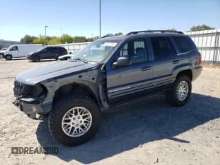 ✅ 2003 Jeep Grand Cherokee Limited • VIN: 1J4GW58N03C589039 • Lot: 69321965. Listed on Copart with 160,624 mi. Free auction sales archive from the USA and detailed vehicle history report at DreamBid. Image 1.